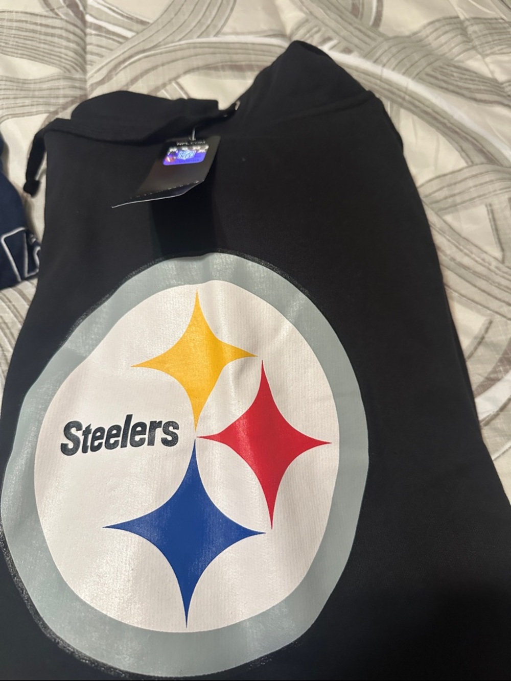 NFL Black hoodie sleeveless with Team Logo and Yellow, Red, Blue Accents